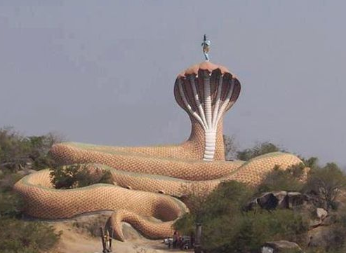 Adishesha is the King of the Serpents upon which Vishnu rests in His eternal abode in the Garbhodaka ocean at the depths of the Universe